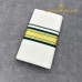 Off-White Pure Handloom Balaramapuram Kasavu Double Mundu with Broad Gold Kasavu and Dark Green Kara
